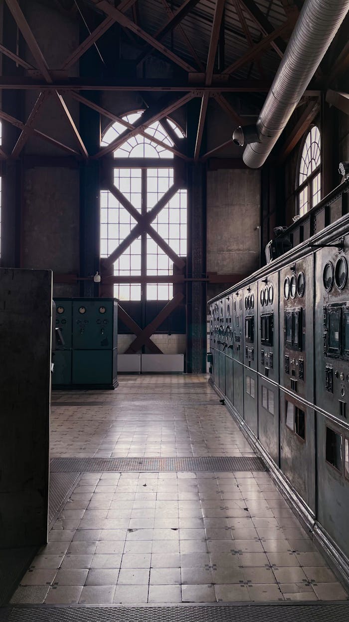 Abandoned industrial plant interior in Istanbul showcasing vintage machinery and architecture.